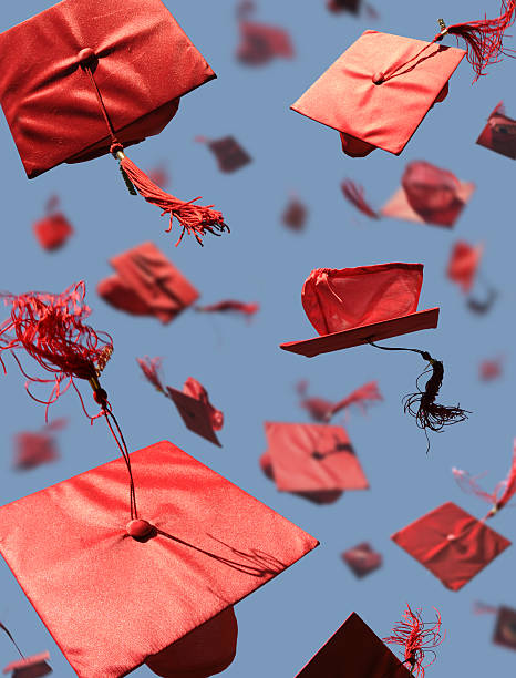 Graduation+caps+with+motion+blur.